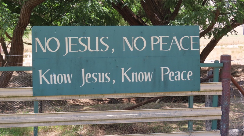 Sign with the words: No Jesus. No peace. Know Jesus. Know peace.